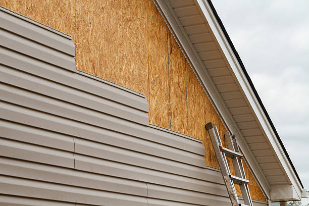 Professional Emergency Siding Repair technician working in Spring Valley, NY